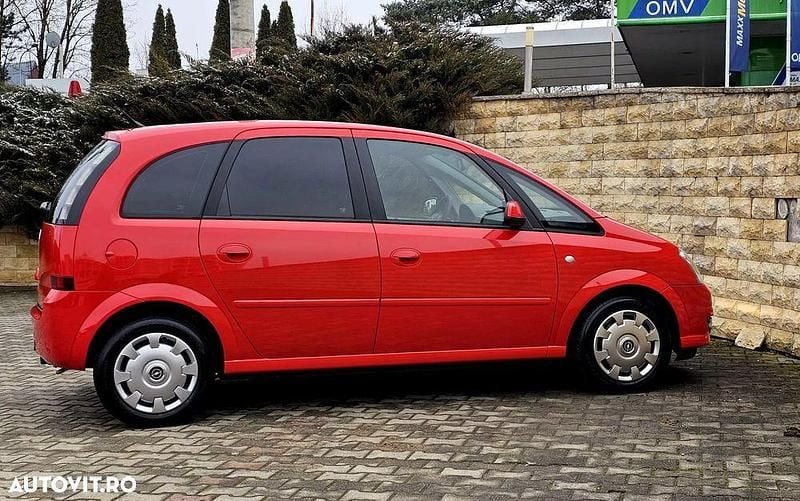 Second-hand Opel Meriva 100 CP (73 kW) 2009 Culoarerosu Monovolum