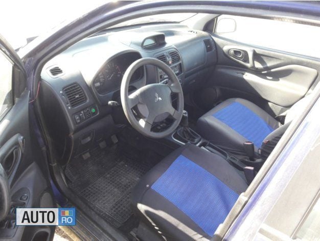 Second-hand Mitsubishi Space Star 105 CP (77 kW) 2003 Albastru Monovolum