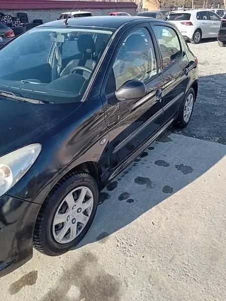 Second-hand Peugeot 206 78 CP (57 kW) 2010 Negru Berlinǎ