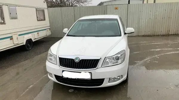 Utilizat 2012 Skoda Octavia Berlinǎ | 4.100 EUR (Preț bun) - Imagine 1/4