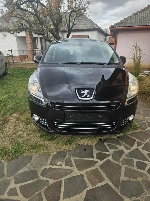 Second-hand Peugeot 5008 112 CP (82 kW) 2012 Negru Monovolum