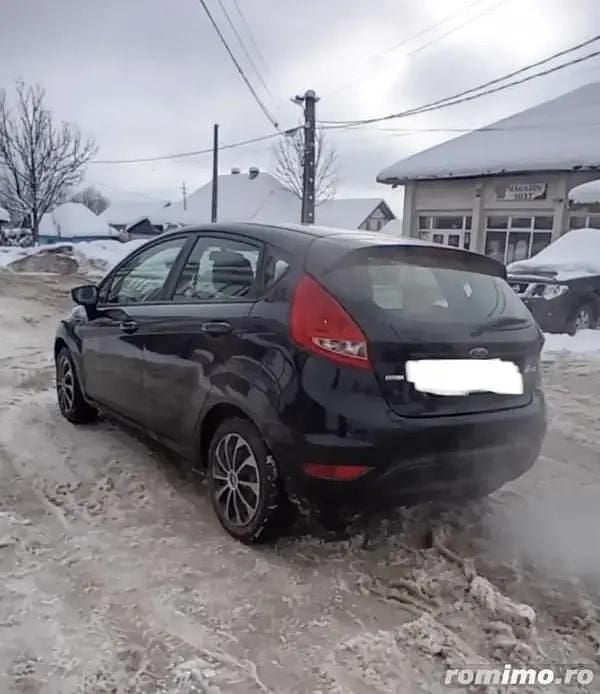 Second-hand Ford Fiesta 70 CP (51 kW) 2010 Negru Berlinǎ