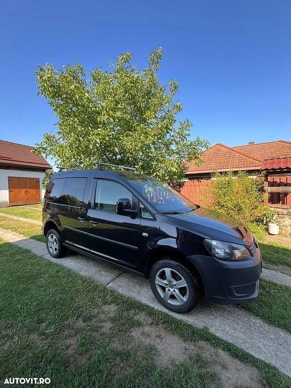 Culoarenegru Utilizat 2014 VW Caddy Comfortline Monovolum | 6.000 EUR (Super Preț) - Imagine 1/4