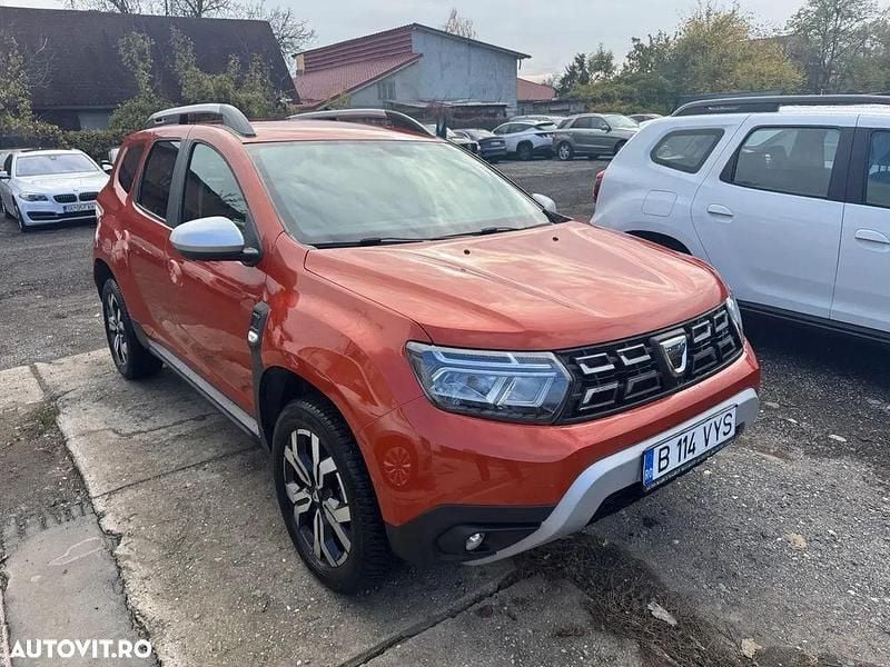 Culoareportocaliu Utilizat 2022 Dacia Duster Prestige SUV | 13.000 EUR (Super Preț) - Imagine 1/4