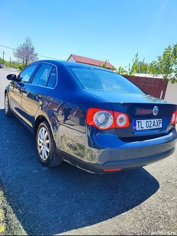 Second-hand VW Jetta 136 CP (100 kW) 2007 Albastru Berlinǎ