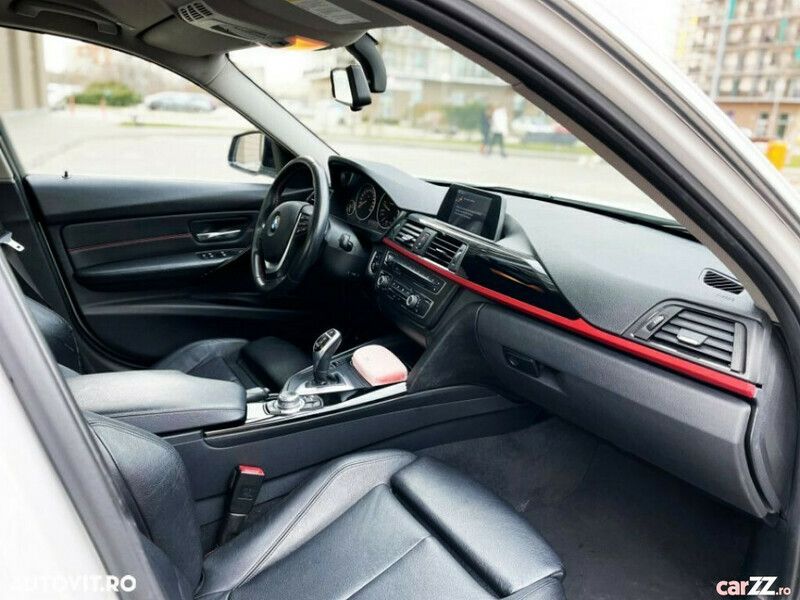 Second-hand BMW 320 Sport Line 164 CP (120 kW) 2013 Alb Berlinǎ