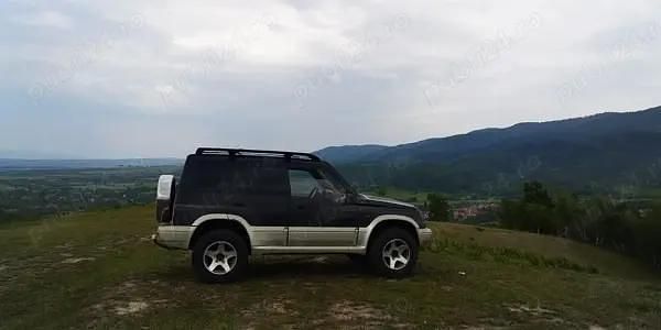 Second-hand Suzuki Vitara 150 CP (110 kW) 1998 Negru SUV