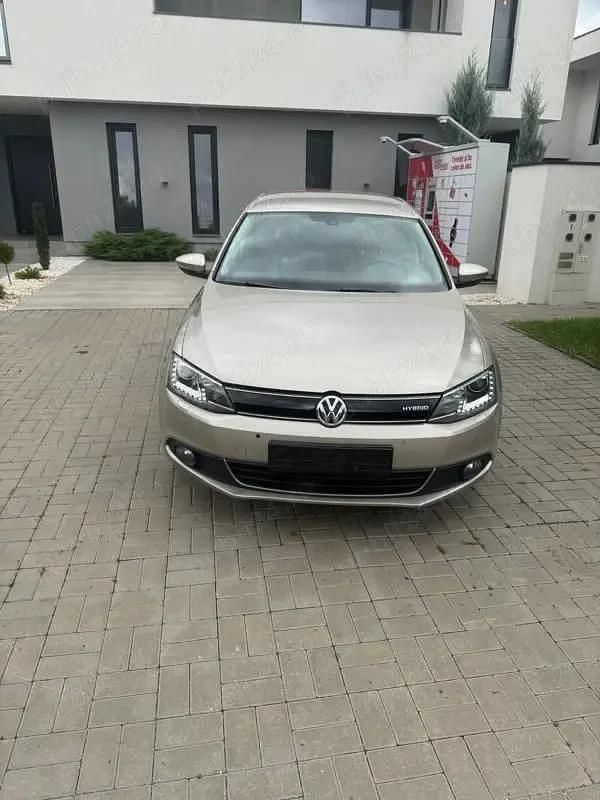 Utilizat 2014 VW Jetta Hybrid Berlinǎ | 7.999 EUR - Imagine 1/4