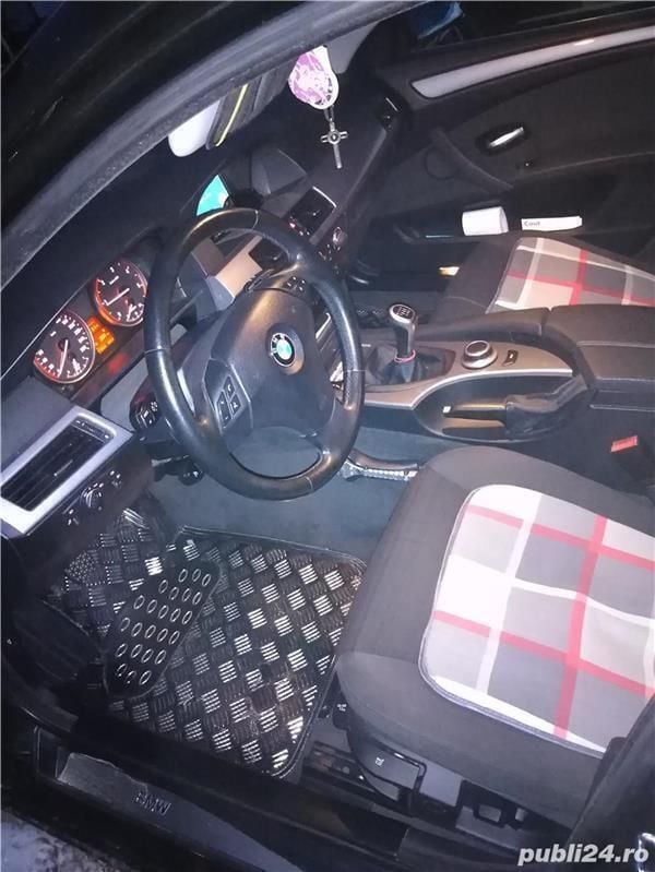 Second-hand BMW 520 177 CP (130 kW) 2009 Negru Berlinǎ