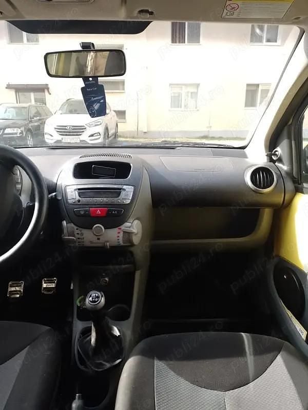 Second-hand Peugeot 107 65 CP (47 kW) 2010 Galben Hatchback