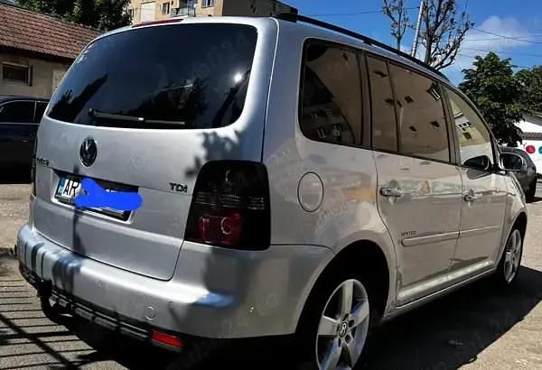 Second-hand VW Touran United 105 CP (77 kW) 2008 Monovolum
