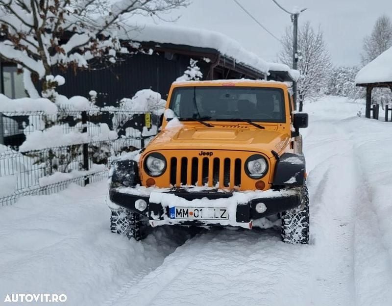 Second-hand Jeep Wrangler 200 CP (147 kW) 2013 Culoareportocaliu SUV