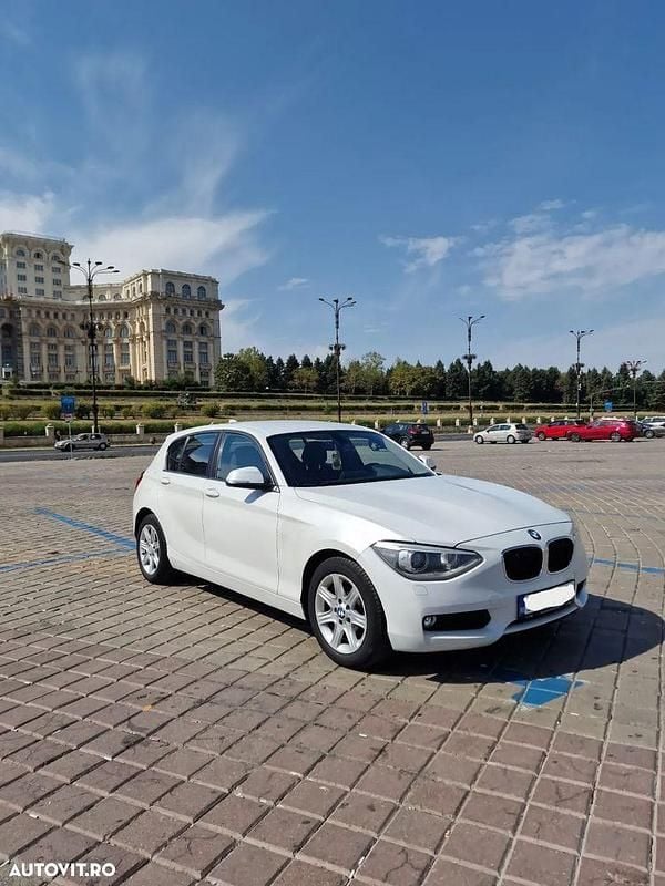 Culoarealb Utilizat 2012 BMW 118 Hatchback | 5.200 EUR (Preț bun) - Imagine 1/4