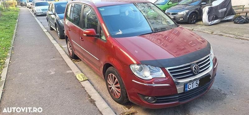 Second-hand VW Touran Comfortline 140 CP (102 kW) 2006 Culoarerosu Monovolum
