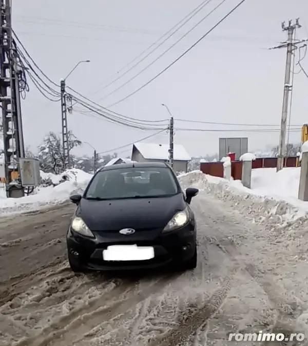 Second-hand Ford Fiesta 70 CP (51 kW) 2010 Negru Berlinǎ