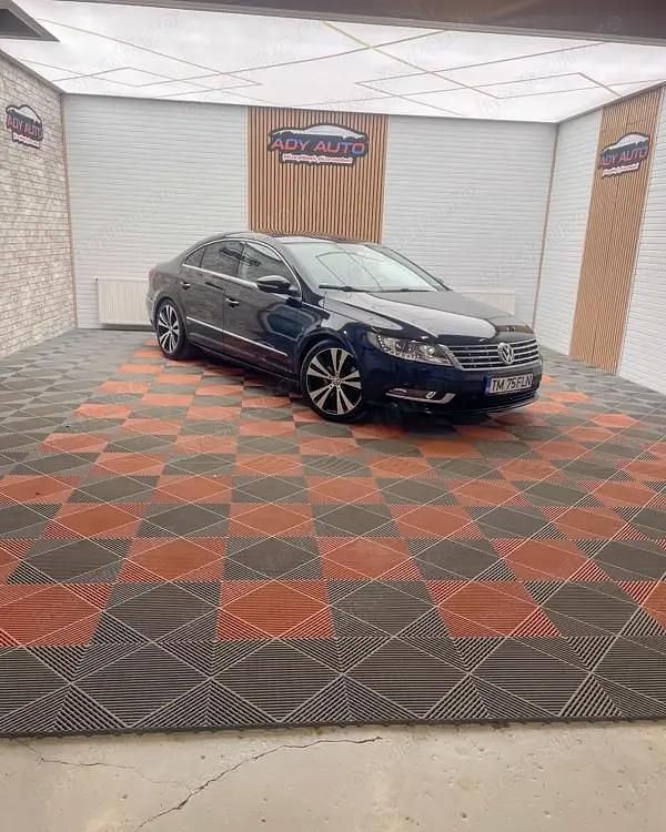 Second-hand VW Passat R 140 CP (102 kW) 2012 Negru Berlinǎ