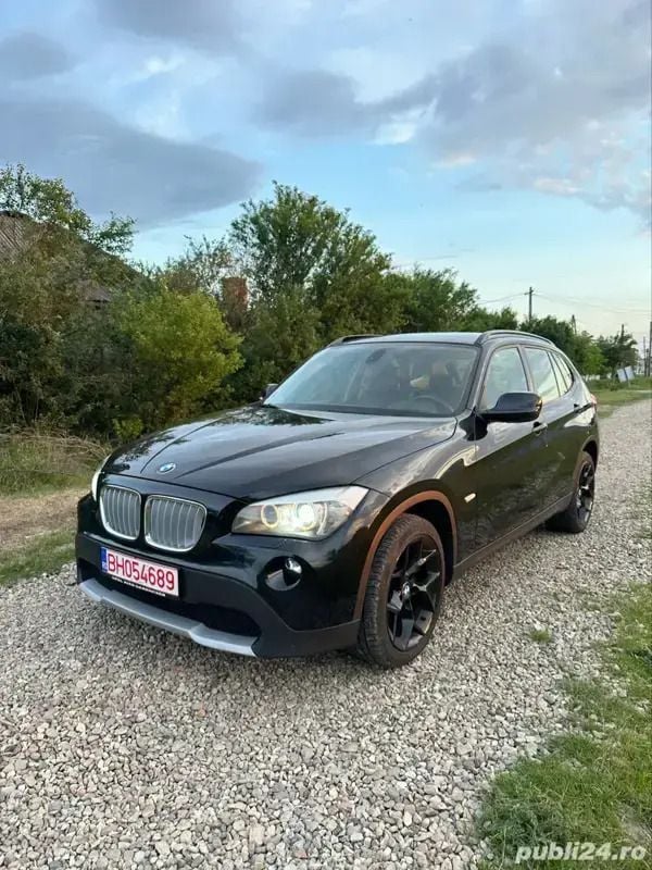 Negru Utilizat 2012 BMW X1 SUV | 8.800 EUR (Preț bun) - Imagine 1/4
