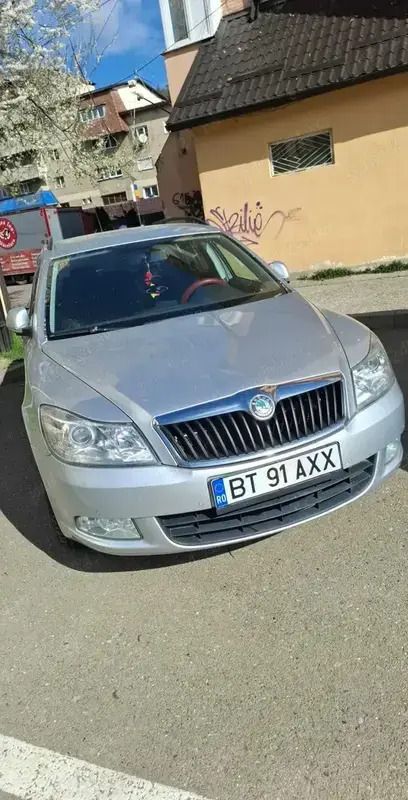 Argintiu Utilizat 2010 Skoda Octavia Break | 4.200 EUR (Preț OK) - Imagine 1/4