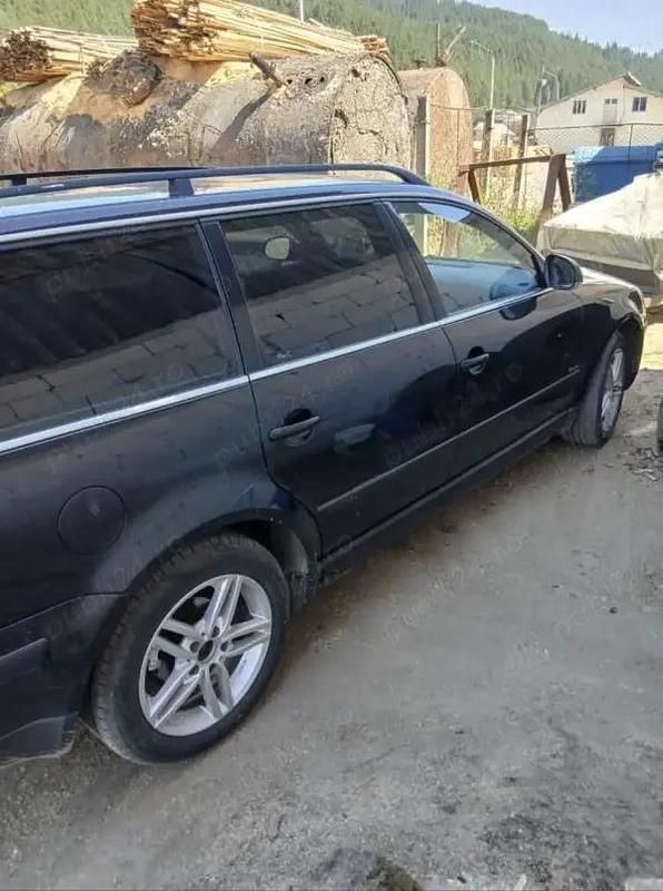 Second-hand VW Passat 136 CP (100 kW) 2005 Negru Break