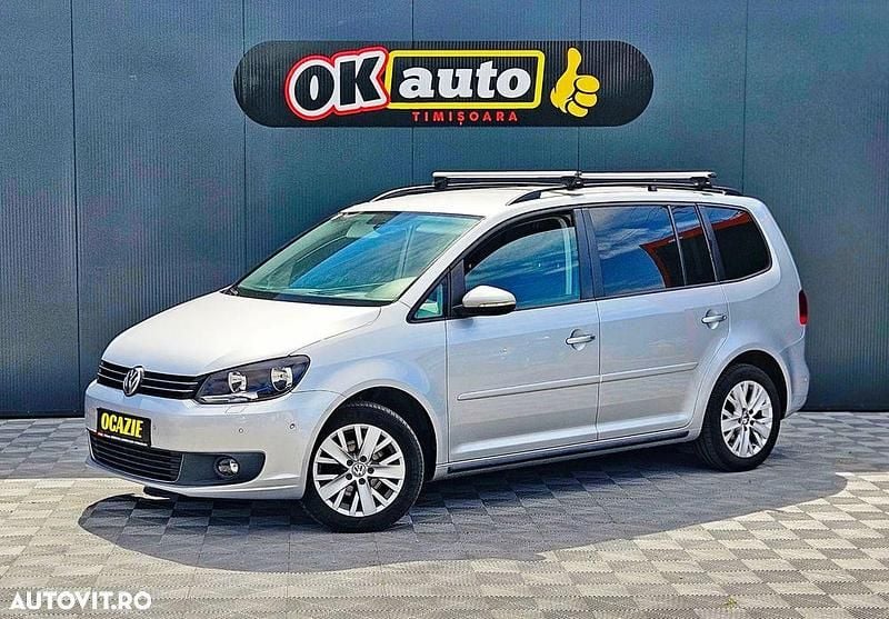 Second-hand VW Touran 105 CP (77 kW) 2013 Culoareargint Monovolum