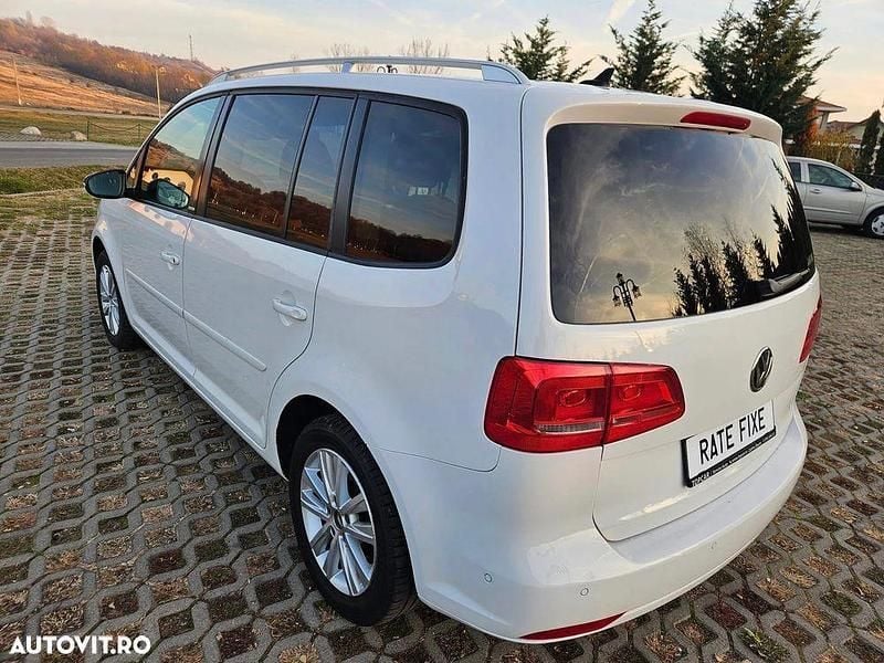 Second-hand VW Touran Style 105 CP (77 kW) 2011 Alb Monovolum