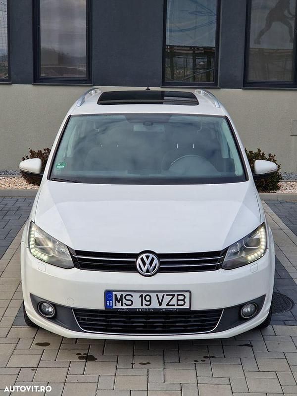 Second-hand VW Touran Highline 170 CP (125 kW) 2011 Culoarealb Monovolum