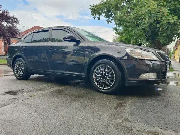 Negru Utilizat 2012 Skoda Octavia LAURIN & KLEMENT Berlinǎ | 9.300 EUR - Imagine 1/4