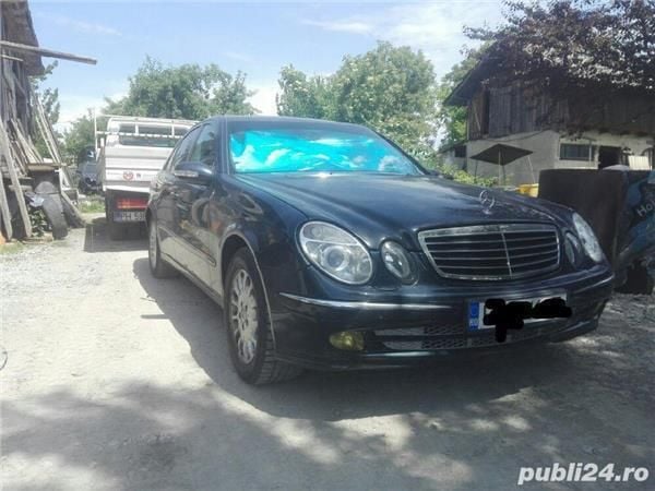 Second-hand Mercedes E320 204 CP (150 kW) 2004 Negru Berlinǎ