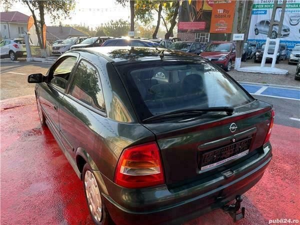 Second-hand Opel Astra 101 CP (74 kW) 2002 Verde Coupe