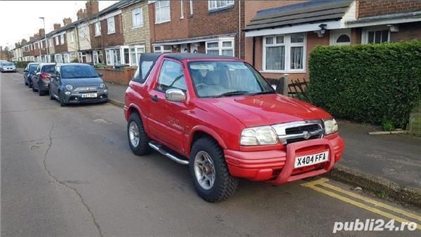 Rosu Utilizat 2000 Suzuki Grand Vitara Sport SUV | 4.000 EUR - Imagine 1/4