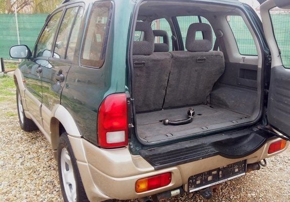 Second-hand Suzuki Grand Vitara 109 CP (80 kW) 2003 Verde metalizat SUV