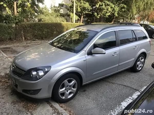 Argintiu Utilizat 2009 Opel Astra Break | 2.400 EUR (Preț OK) - Imagine 1/4