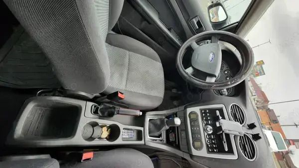 Second-hand Ford Focus 100 CP (73 kW) 2005 Albastru Hatchback