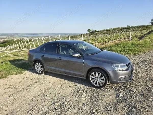 Second-hand VW Jetta 105 CP (77 kW) 2012 Gri Berlinǎ