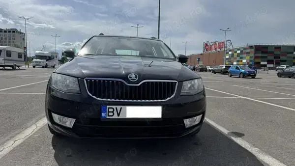 Negru Utilizat 2014 Skoda Octavia Break | 7.300 EUR (Preț bun) - Imagine 1/4