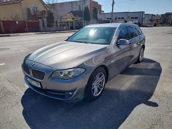 Gri Second-hand 2012 BMW 218 Break | 8.200 EUR (Preț bun) - Imagine 1/4