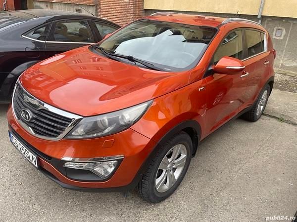 Second-hand Kia Sportage 184 CP (135 kW) 2013 Portocaliu SUV
