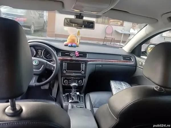 Second-hand Skoda Superb 140 CP (102 kW) 2009 Negru Berlinǎ