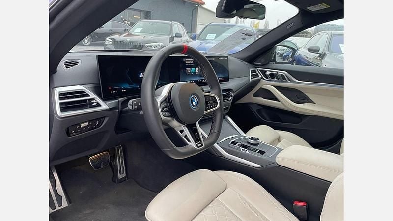 Second-hand BMW i4 Comfort Edition 400 kW (544 CP) 2025 Albastru frozen portimao metalizat bmw individual metalizat Berlinǎ