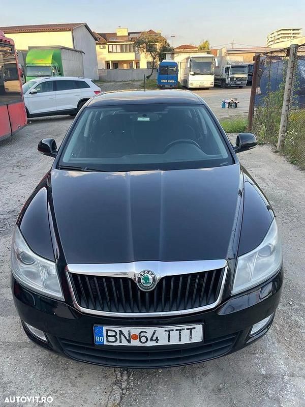 Culoarenegru Utilizat 2012 Skoda Octavia Business Line Berlinǎ | 5.350 EUR - Imagine 1/4