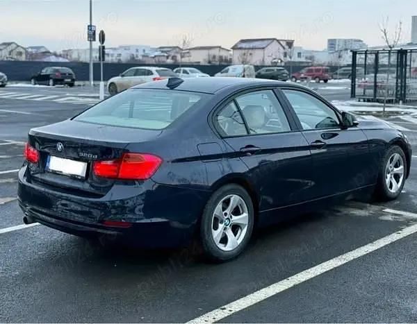 Second-hand BMW 320 163 CP (119 kW) 2012 Albastru Berlinǎ