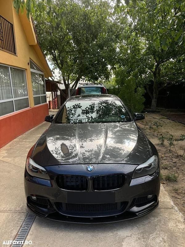 Culoarenegru Utilizat 2011 BMW 530 Sport Line Berlinǎ | 11.300 EUR (Preț bun) - Imagine 1/4