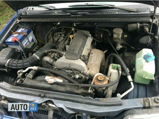 Second-hand Suzuki Jimny 82 CP (60 kW) 2003 Albastru SUV