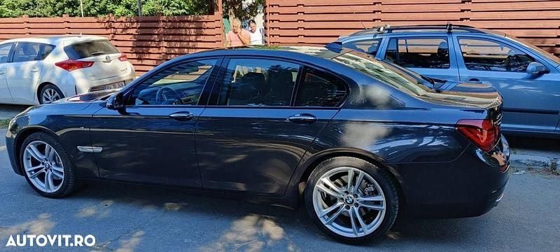 Gri Utilizat 2014 BMW 740 Berlinǎ | 17.400 EUR (Super Preț) - Imagine 1/4