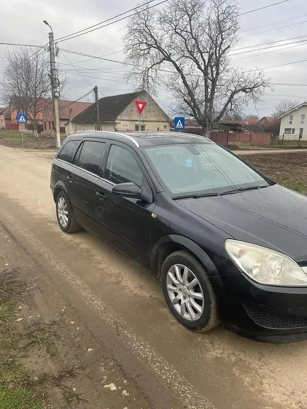 Second-hand Opel Astra 101 CP (74 kW) 2010 Negru Break