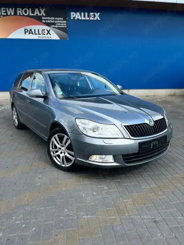 Gri Utilizat 2012 Skoda Octavia Elegance Break | 5.990 EUR (Preț OK) - Imagine 1/4