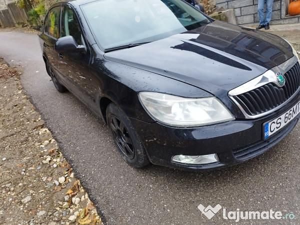 Negru Utilizat 2011 Skoda Octavia Classic Berlinǎ | 4.100 EUR (Puțin scump) - Imagine 1/4