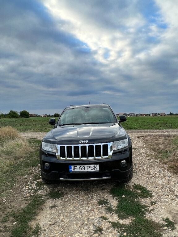 Negru Utilizat 2012 Jeep Grand Cherokee Limited SUV | 15.800 EUR - Imagine 1/4
