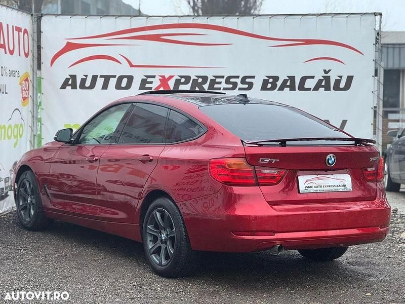 Second-hand BMW 318 Comfort Edition 143 CP (105 kW) 2014 Culoarerosu Berlinǎ
