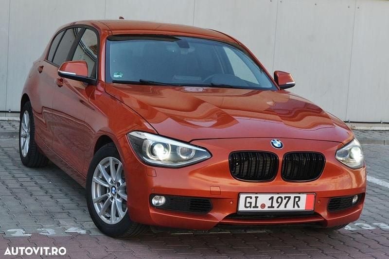 Portocaliu Utilizat 2012 BMW 120 Hatchback | 7.350 EUR - Imagine 1/4